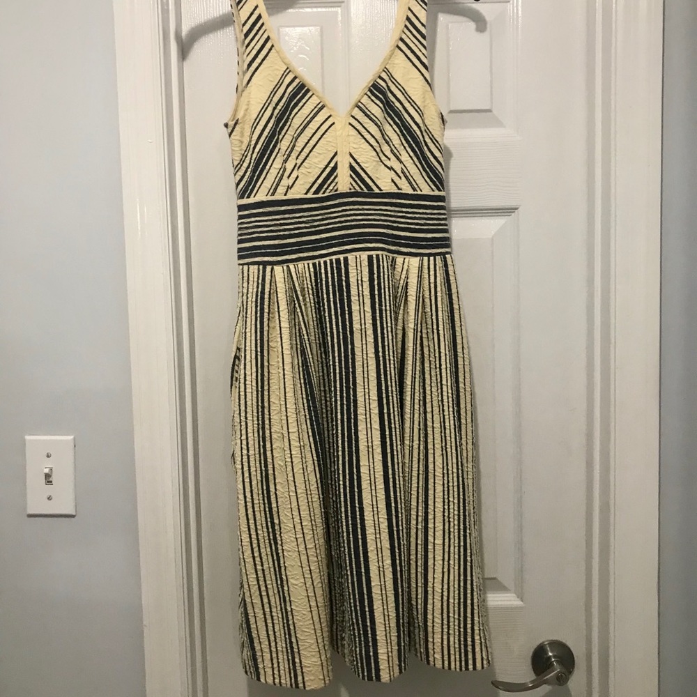 Strapless V neck and back dress.